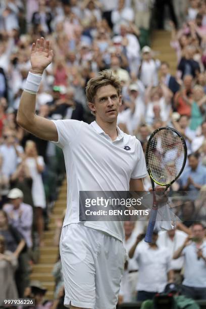 South Africa's Kevin Anderson reacts after winning against US player John Isner during the final set tie-break of their men's singles semi-final...