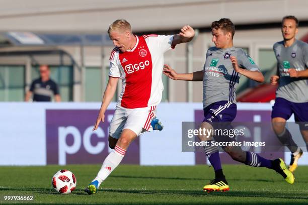 Donny van de Beek of Ajax, Pieter Gerkens of Anderlecht during the Club Friendly match between Ajax v Anderlecht at the Olympisch Stadion on July 13,...