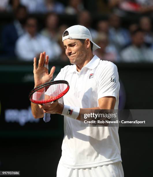 John Isner during his match against Kevin Anderson in their Men's Semi-Final match at All England Lawn Tennis and Croquet Club on July 13, 2018 in...