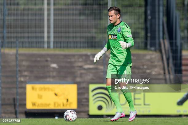 Goalkeeper Daniel Davari of Duisburg controls the ball during the TEDi-Cup match between Hertha BSC and MSV Duisburg on July 8, 2018 in Herne,...