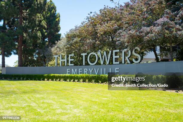 Sign with logo at entrance to the office park Towers of Emeryville in Emeryville, California, July 10, 2018.