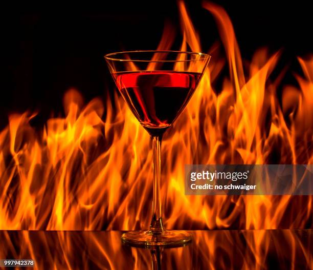 this glas is on fire - glas stock pictures, royalty-free photos & images