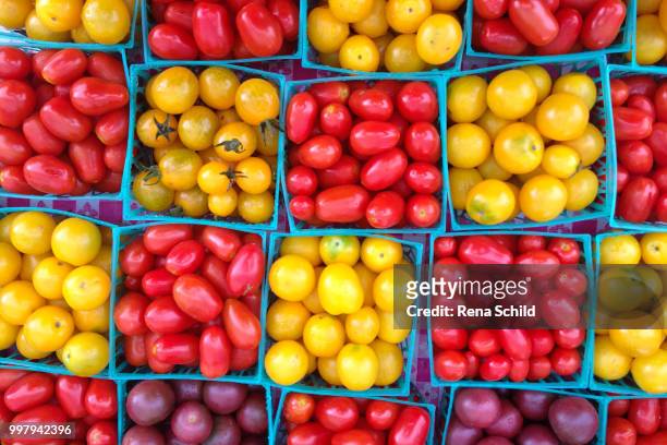 colorful cherry tomatoes - schild stock pictures, royalty-free photos & images