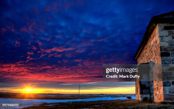 sunset and the stone house - mark duffy stock pictures, royalty-free photos & images