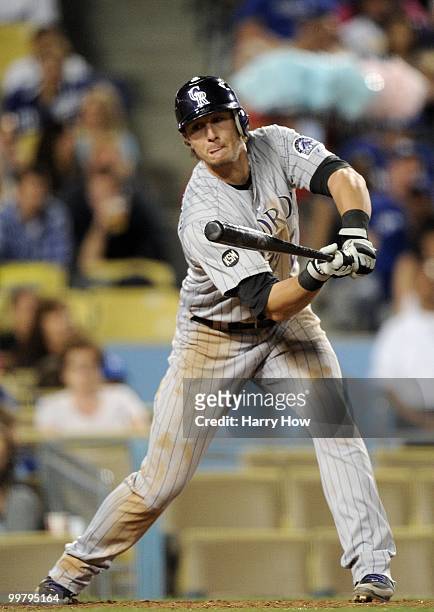 Troy Tulowitzki of the Colorado Rockies makes a check swing against the Los Angeles Dodgers at Dodger Stadium on May 7, 2010 in Los Angeles,...