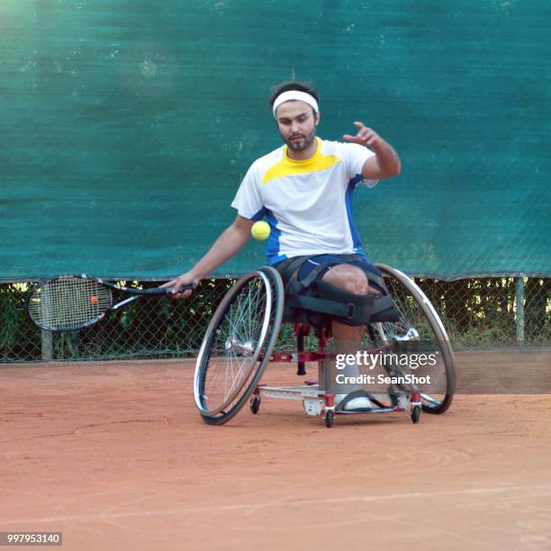 disabled tennis player - wheelchair tennis stock pictures, royalty-free photos & images