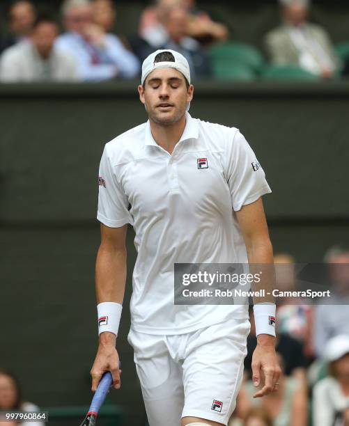 John Isner during his match against Kevin Anderson in their Men's Semi-Final match at All England Lawn Tennis and Croquet Club on July 13, 2018 in...