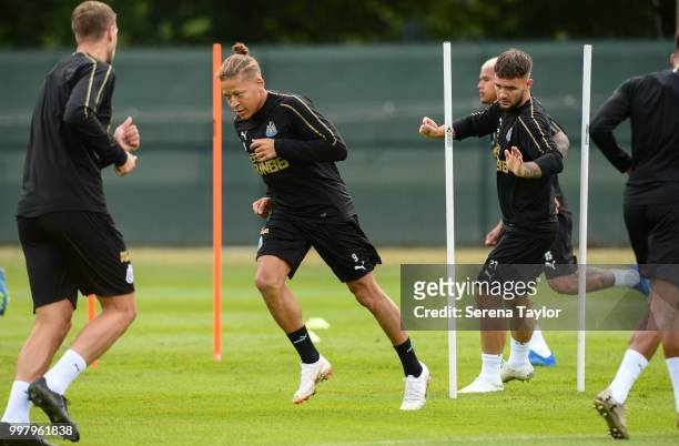 Dwight Gayle runs around training poles during the Newcastle United Training session at Carton House on July 13 in Kildare, Ireland.
