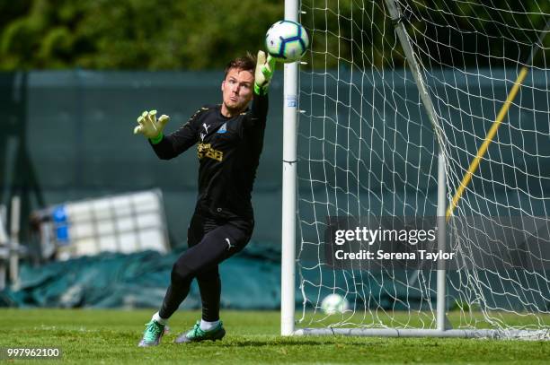 Goalkeeper Freddie Woodman makes a save during the Newcastle United Training session at Carton House on July 13 in Kildare, Ireland.