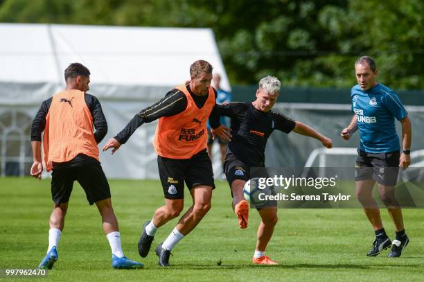 Matt Ritchie and Florian Lejeune jostle for the ball during the Newcastle United Training session at Carton House on July 13 in Kildare, Ireland.