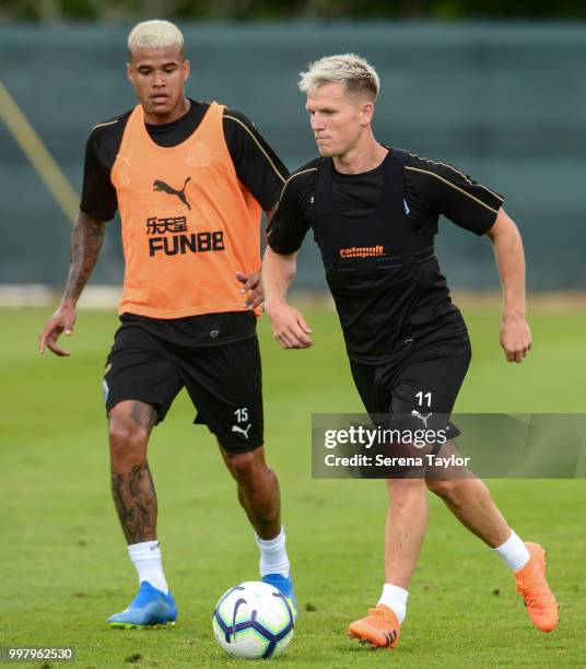 Matt Ritchie controls the ball whilst Kenedy looks to challenge during the Newcastle United Training session at Carton House on July 13 in Kildare,...