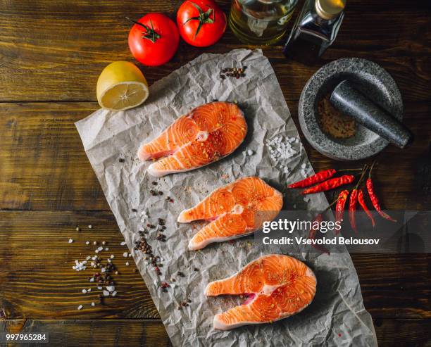 salmon seaks with vegetables and spices. - astragalus bildbanksfoton och bilder