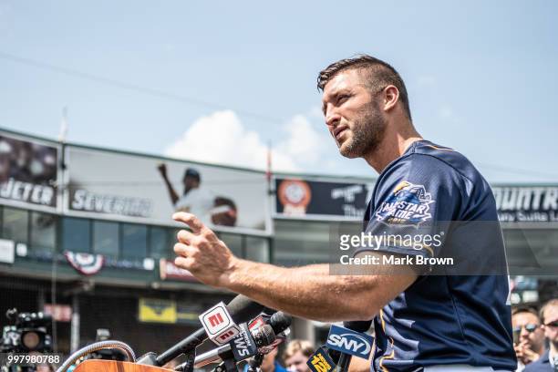 Tim Tebow of the Eastern Division All-Stars answers questions from the media before the 2018 Eastern League All Star Game at Arm & Hammer Park on...