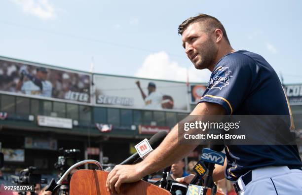 Tim Tebow of the Eastern Division All-Stars answers questions from the media before the 2018 Eastern League All Star Game at Arm & Hammer Park on...