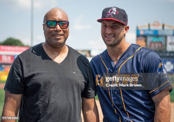 Tim Tebow of the Eastern Division All-Stars poses with former New York Yankee Bernie Williams before the 2018 Eastern League All Star Game at Arm &...