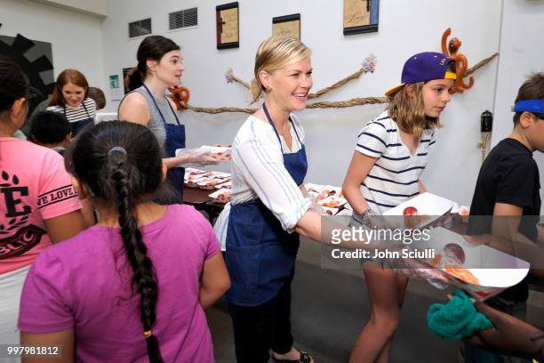 Actors Darby Stanchfield, Alison Sweeney and Betsy Brandt volunteer with Feeding America and the Los Angeles Regional Food Bank to raise awareness...