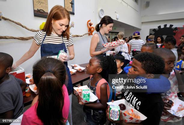 Actors Darby Stanchfield, Alison Sweeney and Betsy Brandt volunteer with Feeding America and the Los Angeles Regional Food Bank to raise awareness...