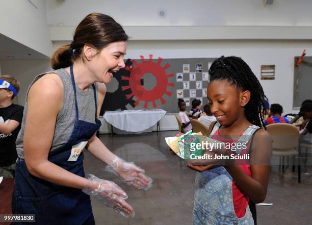 Actress Betsy Brandt volunteers with Feeding America and the Los Angeles Regional Food Bank to raise awareness around Summer Hunger at the Siemon...