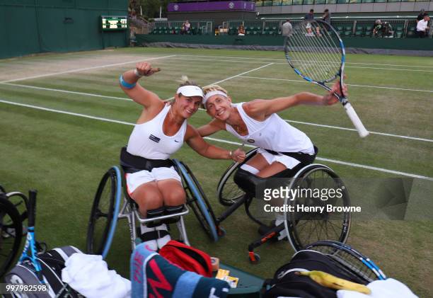 July 13: Lucy Shuker of Great Britain and Sabine Ellerbrock of Germany smile after the postponement of the womens doubles wheelchair semi final...