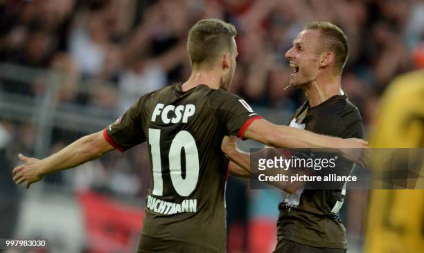 Pauli's Christopher Buchtmann celebrates his goal during the German 2nd Bundesliga soccer match between 1. FC St Pauli and Dynamo Dresden in the...