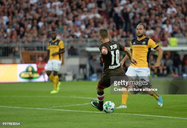 Pauli's Christopher Buchtmann scores a goal during the German 2nd Bundesliga soccer match between 1. FC St Pauli and Dynamo Dresden in the...