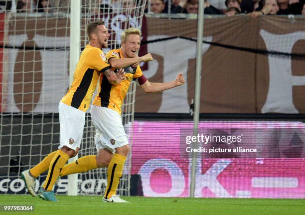 Dresden's Marco Hartmann is celebrating his goal during the German 2nd Bundesliga soccer match between 1. FC St Pauli and Dynamo Dresden in the...