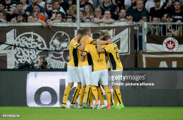 Dresden's Marco Hartmann is celebrating his goal during the German 2nd Bundesliga soccer match between 1. FC St Pauli and Dynamo Dresden in the...