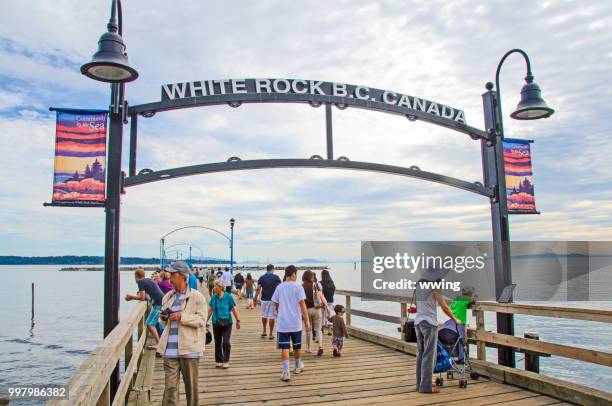 walking pier in white rock british columbia - white rock bc stock pictures, royalty-free photos & images