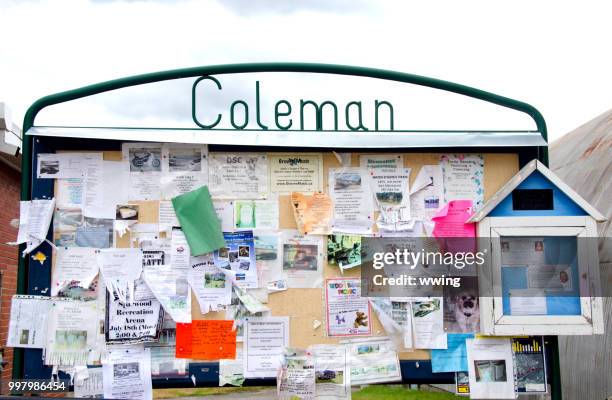 community event and notice board in coleman alberta - coleman stock pictures, royalty-free photos & images