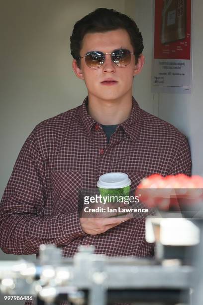 Tom Holland seen filming a new Spiderman movie in Bishop's Stortford on July 2, 2018 in London, England.