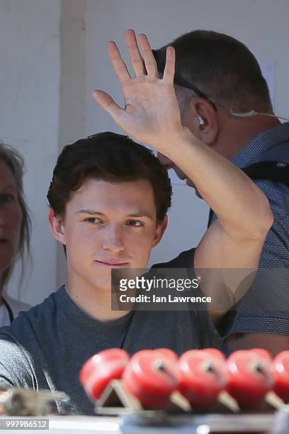 Tom Holland seen filming a new Spiderman movie in Bishop's Stortford on July 2, 2018 in London, England.