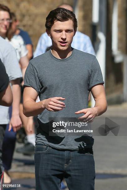 Tom Holland seen filming a new Spiderman movie in Bishop's Stortford on July 2, 2018 in London, England.