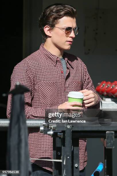 Tom Holland seen filming a new Spiderman movie in Bishop's Stortford on July 2, 2018 in London, England.