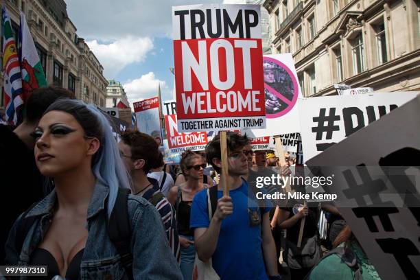 Tens of thousands of protesters gather to march and demonstrate at the Together Against Trump national demonstration on 13th July 2018 in London,...