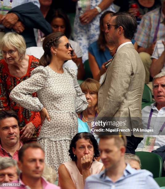Pippa and James Matthews in the stands on centre court on day eleven of the Wimbledon Championships at the All England Lawn Tennis and Croquet Club,...