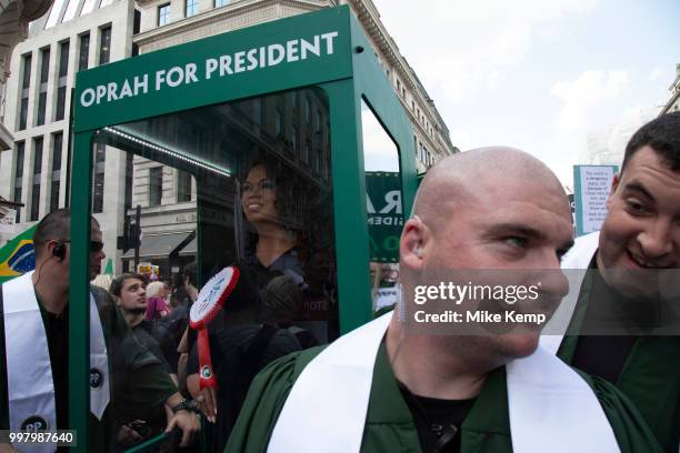 Oprah for President as tens of thousands of protesters gather to march and demonstrate at the Together Against Trump national demonstration on 13th...