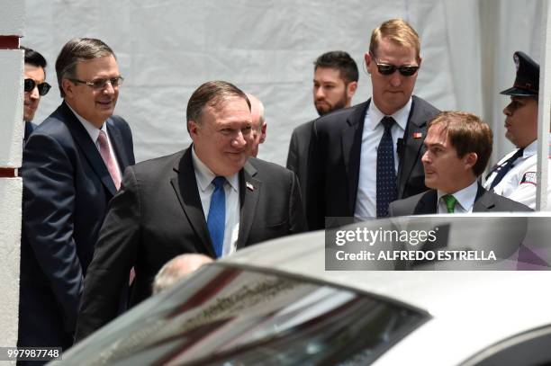 Secretary of State Mike Pompeo , is pictured next to Mexican President-elect Andres Manuel Lopez Obrador's appointed Secretary of Foreign Affairs...