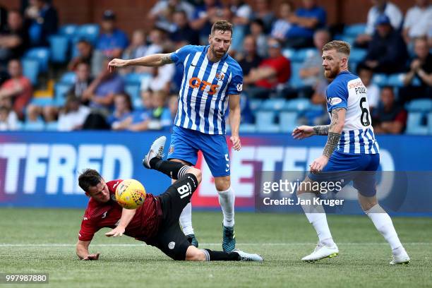 Danny Mullen of St Mirren clashes with Kirk Broadfoot of Kilmarnock FC during the Betfred Scottish League Cup match between Kilmarnock and St Mirren...