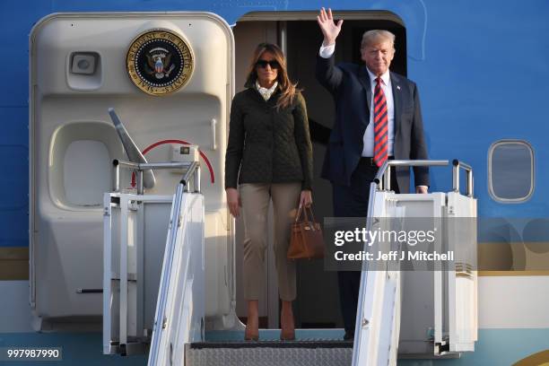 The President of the United States, Donald Trump and First Lady, Melania Trump arrive at Glasgow Prestwick Airport on July 13, 2018 in Glasgow,...