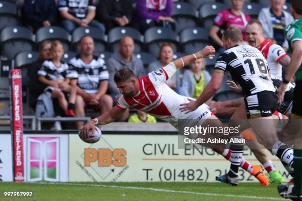 Tommy Makinsons scores a try during the BetFred Super League match between Hull FC and St Helens Saints at the KCOM Stadium on July 13, 2018 in Hull,...