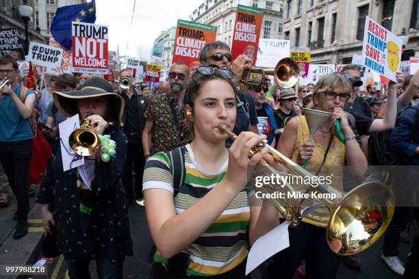 Trumpets for Trump as tens of thousands of protesters gather to march and demonstrate at the Together Against Trump national demonstration on 13th...