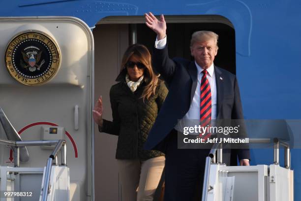 The President of the United States, Donald Trump and First Lady, Melania Trump arrive at Glasgow Prestwick Airport on July 13, 2018 in Glasgow,...