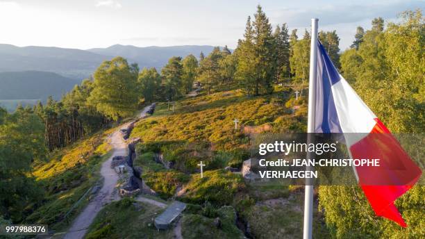 An aerial picture taken on July 11, 2018 near Orbey, eastern France, shows the French national flag flying at the site of the World War One...