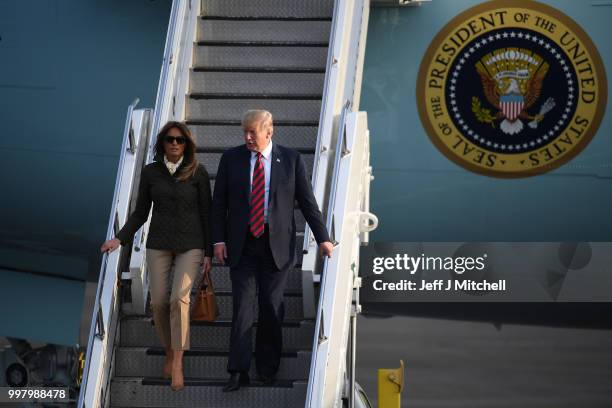 The President of the United States, Donald Trump and First Lady, Melania Trump arrive at Glasgow Prestwick Airport on July 13, 2018 in Glasgow,...