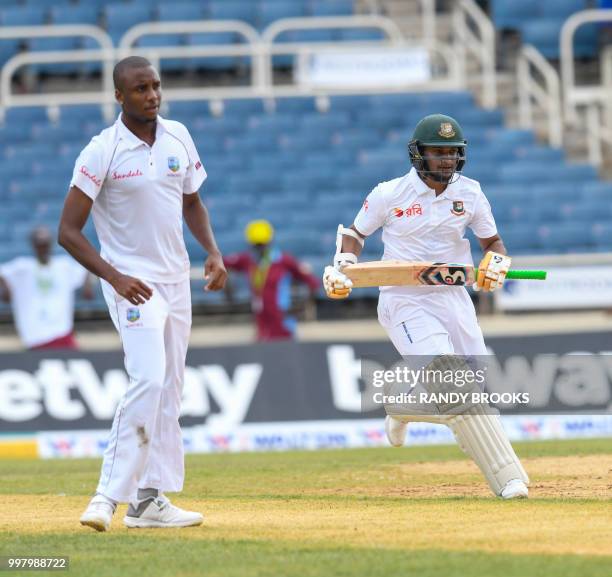 Shakib Al Hasan of Bangladesh get runs off Miguel Cummins of West Indies during day 2 of the 2nd Test between West Indies and Bangladesh at Sabina...