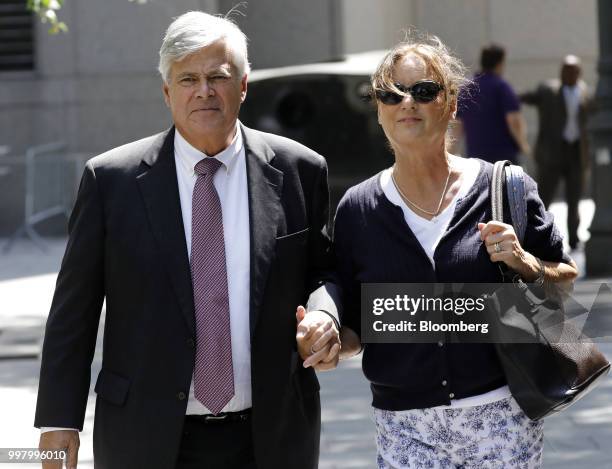 Former State Senate Majority Leader Dean Skelos, left, exits federal court in New York, U.S., on Friday, July 13, 2018. Prosecutors say the...