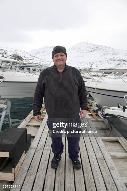 Michael Schluchtmann on a jetty in Nuuk, Greenland, 4 May 2017. Around 50 German ex-pats live on the sparsely populated Arctic island. Photo: Julia...
