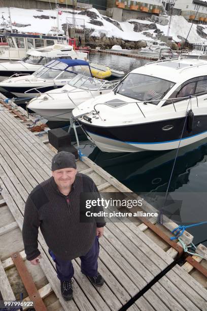 Michael Schluchtmann aon a jetty in Nuuk, Greenland, 4 May 2017. Around 50 German ex-pats live on the sparsely populated Arctic island. Photo: Julia...