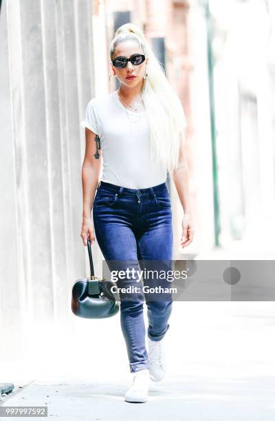 Lady Gaga wears a white T-Shirt and Jeans on July 13, 2018 in New York City.