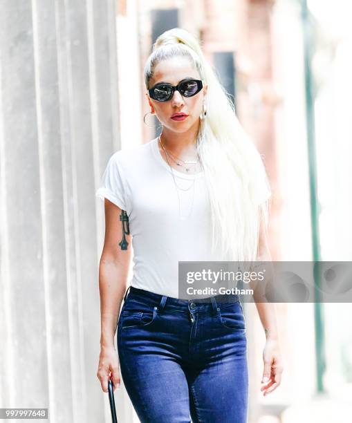 Lady Gaga wears a white T-Shirt and Jeans on July 13, 2018 in New York City.